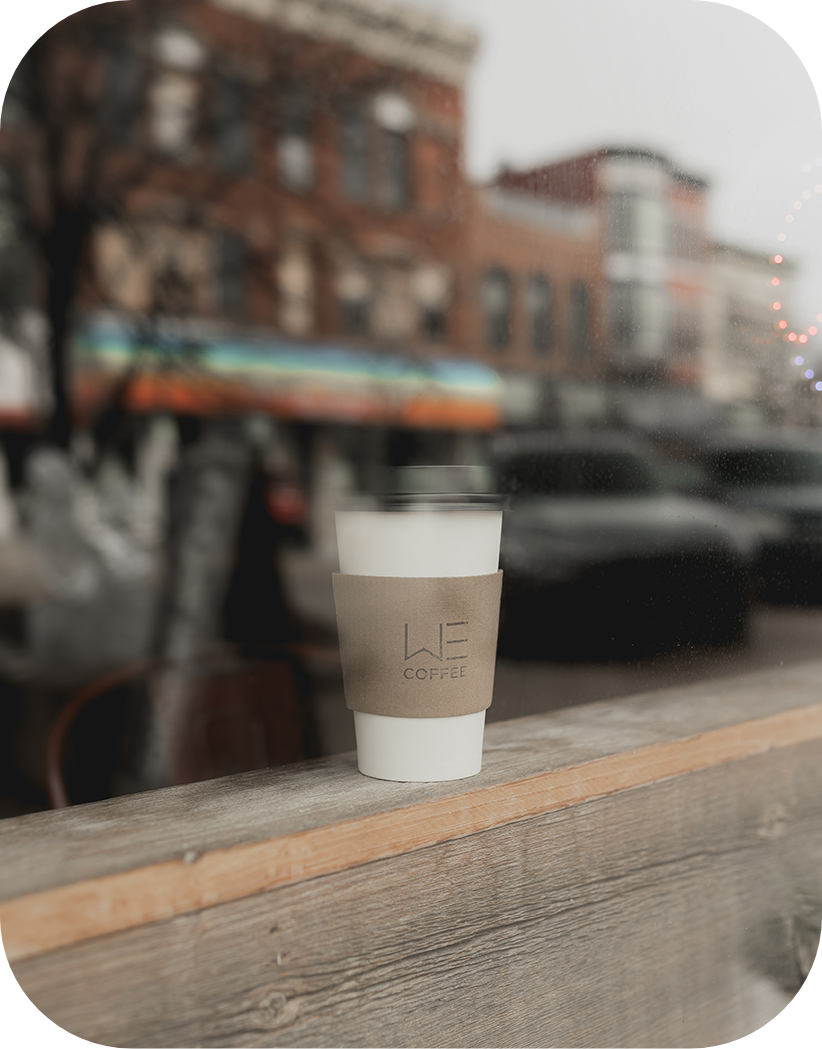 Fresh coffee being poured at WE Coffee Holland